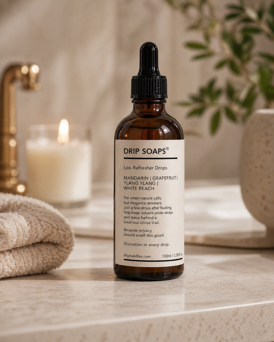 DRIP SOAPS™ dropper top amber bottle styled for a luxury bathroom scene